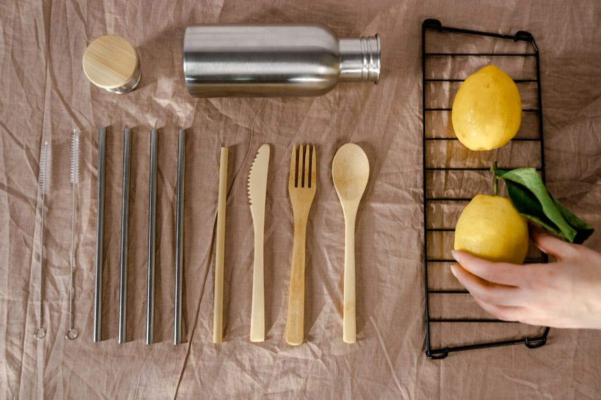 Reusable picnic pieces arranged on a natural textile surface.